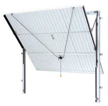 Canopy type garage door with vertical tracks